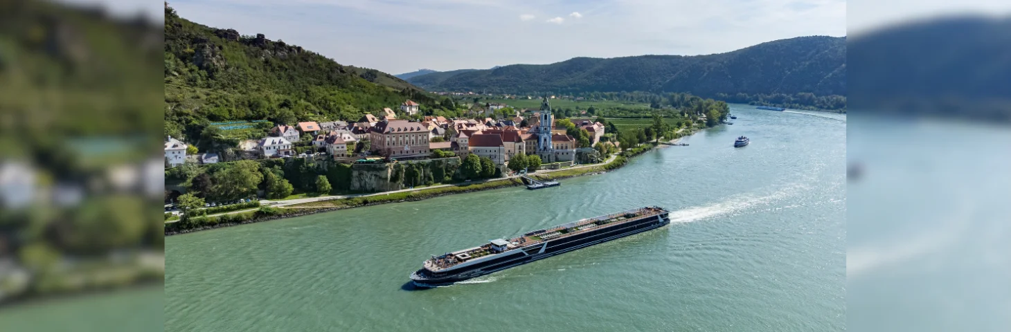 Travelmarvel Vega sailing past Durnstein Town on the Danube river.