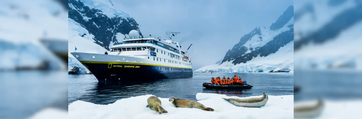 Image of a National geographic cruise ship in ice with seals 