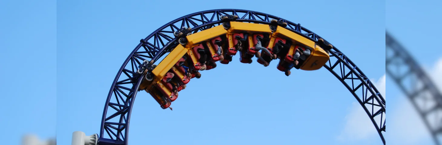 A rollercoaster travelling through an inverted loop.